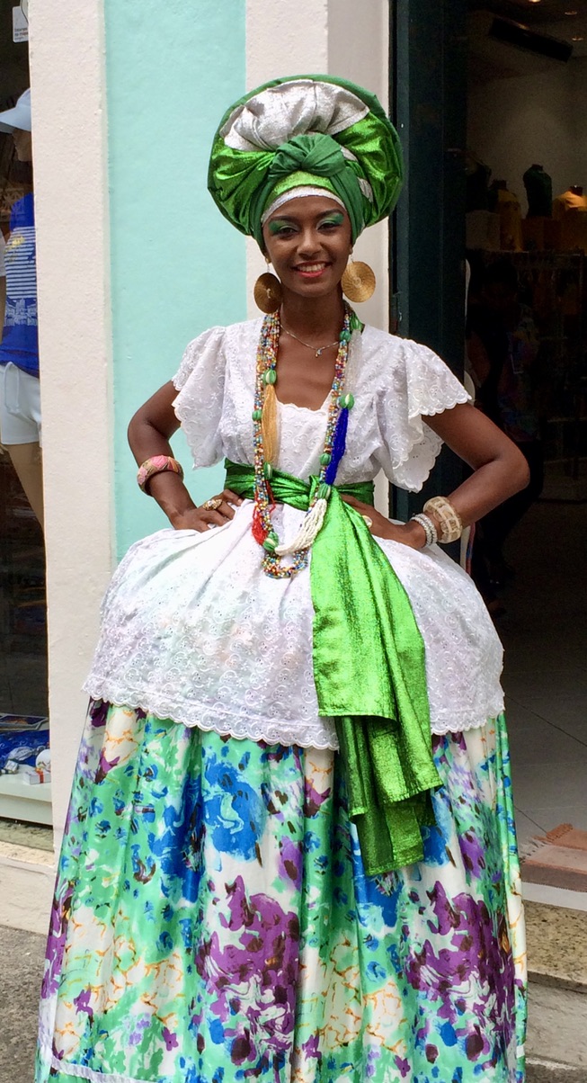 Local woman in Baiana de Acarajé, the traditional dress of Bahia